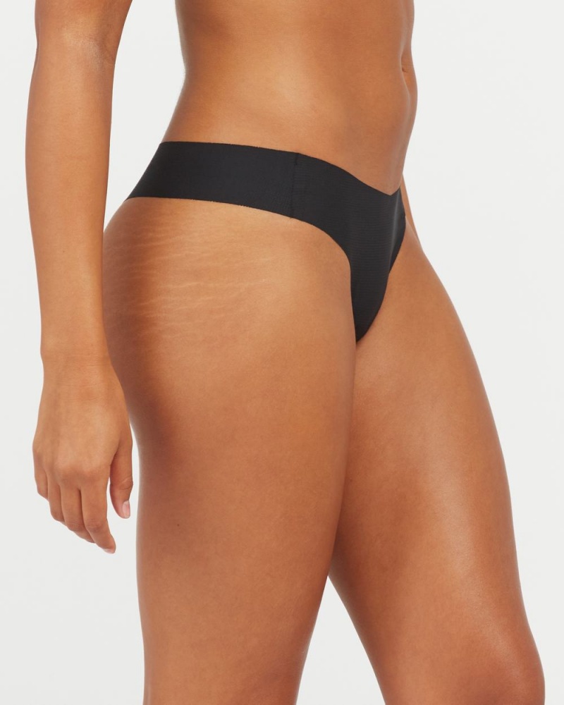 Spanx Under Statements® Thong Black | 46983-YGDN